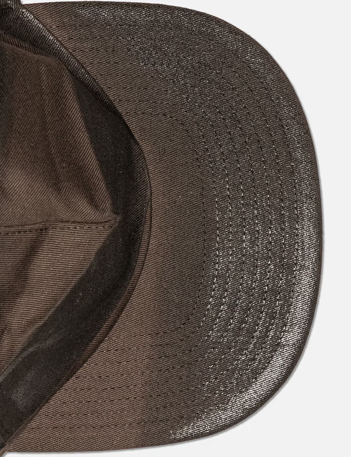 Sprayed Cap