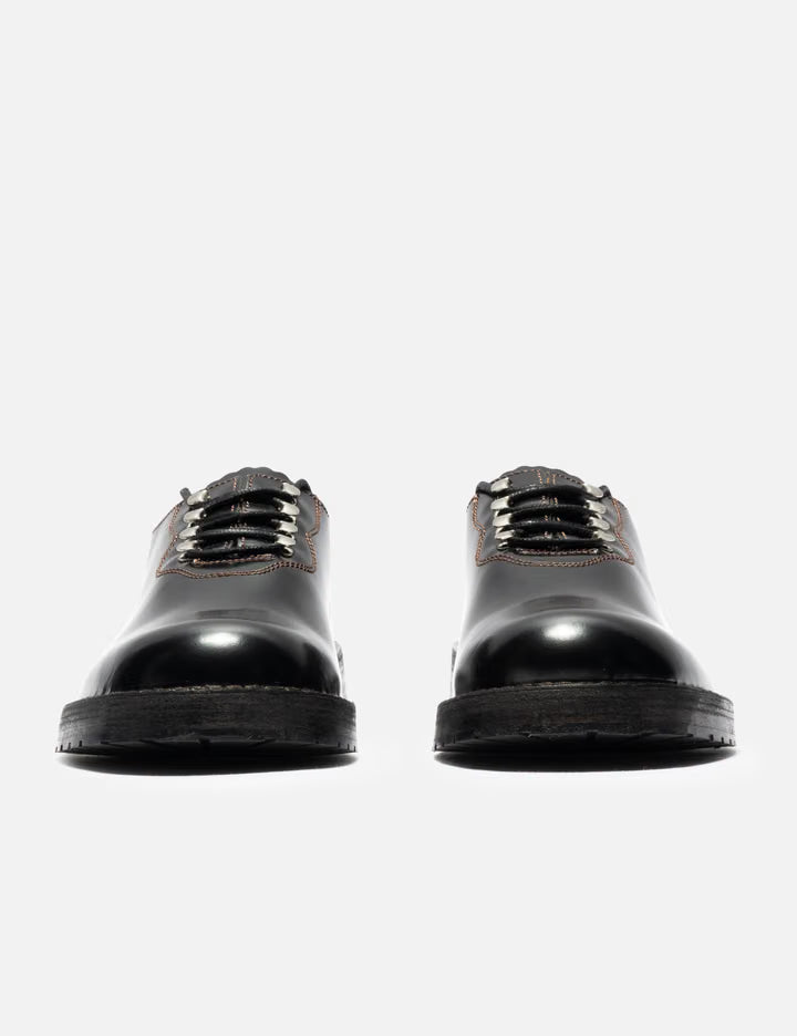 Laced Shoe