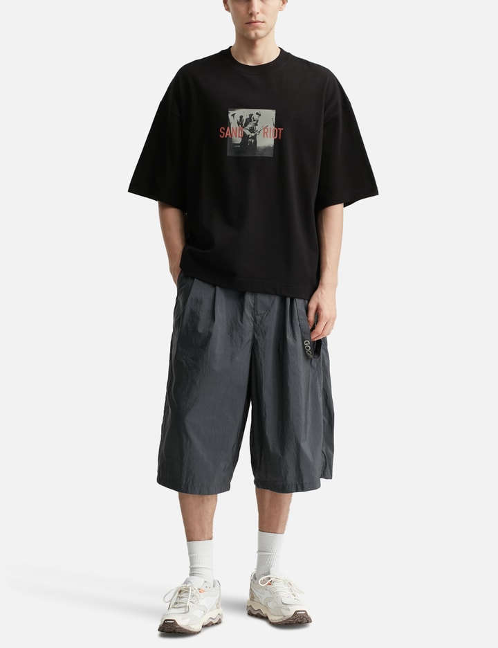 GOOPiMADE x TIGHTBOOTH “GTB-03T” Sand Riot Logo T-shirt