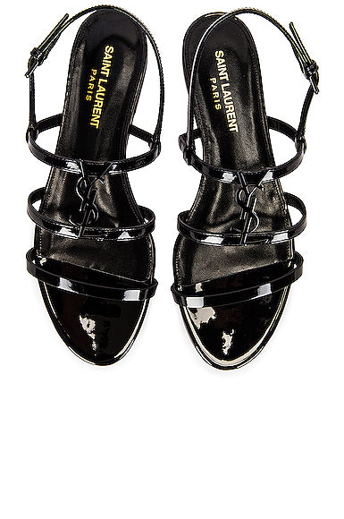 Ysl cassandra 2024 flat sandals