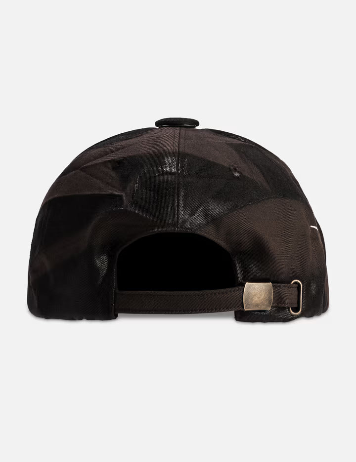 Sprayed Cap