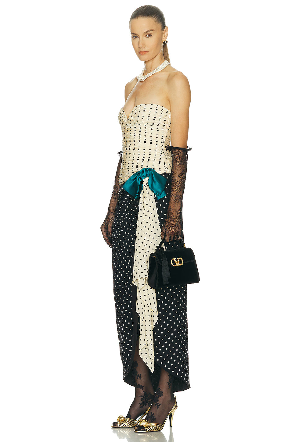 V Sling Mini Top Handle Bag