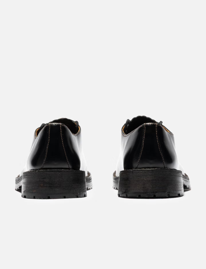 Laced Shoe