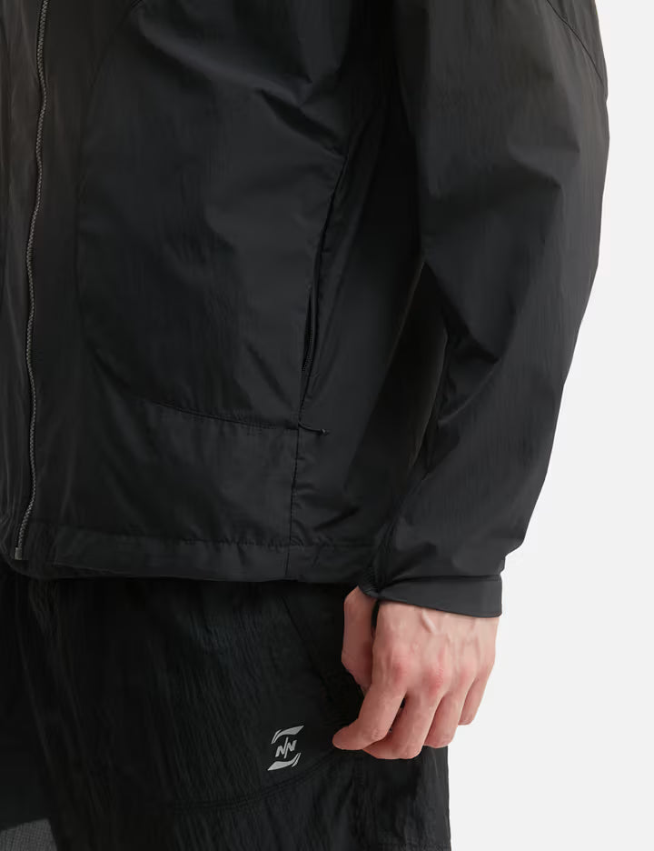 NīNEpointNīNE X Li-Ning Light Tracking Laser Windbreaker